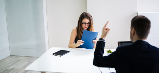 Boss Blaming Female Executive