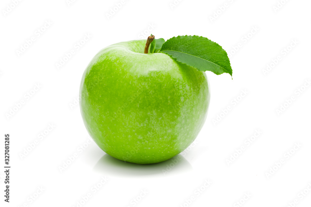 Wall mural ripe green apple with leaf on a white background .