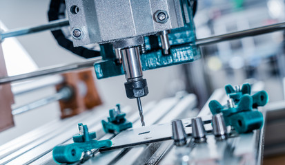 CNC milling machine cutting aluminium  part.