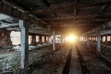 Fototapeta na wymiar Interior of the old ruined abandoned barn