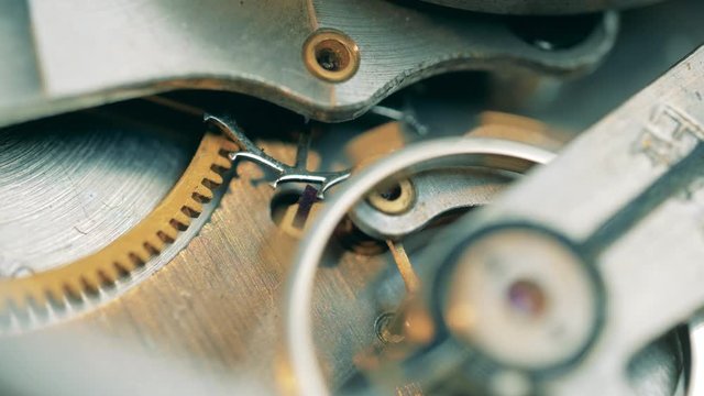 Interlocking elements of a vintage watch in a close up
