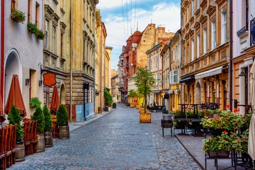 Fotobehang A street in historical Old town of Lviv, Ukraine © Boris Stroujko