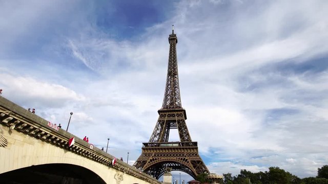 Eiffel tower seen from under the bridge. Famous travel landmark in Paris. Popular European city & honeymoon destination. 