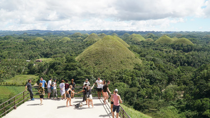 Green grass on the Chocolate Hills in Central Visayas on Bohol Island, Philippines.