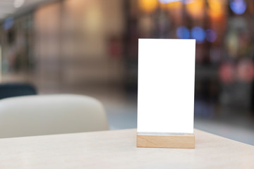 Mock up Label the blank menu frame in Bar restaurant ,Stand for booklets with white sheets paper...