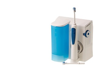 Water jet  irrigator cleaning system and two waterjet heads isolated on white background. Health care concept.