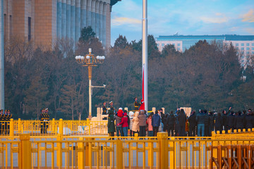 Beijing, China - Jan 17 2020: The Flag Raising Ceremony at Tiananmen Square, is a traditional military ceremony of the People's Liberation Army of China, held at sunrise and sunset every day