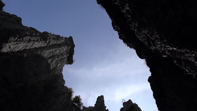 A Sliding shot looking up at the Putangirua Pinnacles in New Zealand