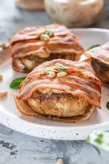 Baked mushrooms stuffed with cheese and pine nuts