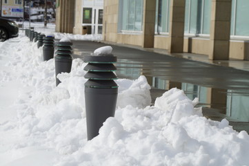 snow, snow removal, trees in the snow, winter in the city, streets in the snow, public utilities, lights in the snow, winter day