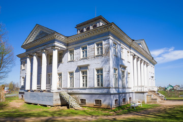 Old house closeup on a sunny May day, Leningrad region, Rozhdestveno