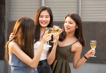 young happy asian friends party dancing with beer