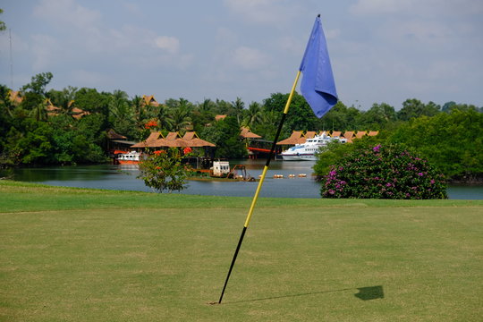 Batam Indonesia - View To A Golf Course Hole And Nongsa Point Ferry Terminal In Background