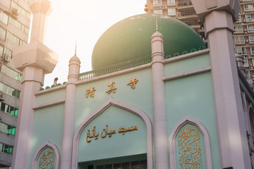 mosque in the city at morning,the chinese words meaning mosque.