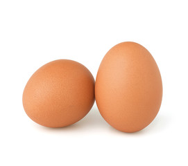 Raw chicken eggs isolated on the white background.
