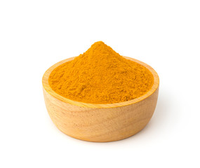 Turmeric (Curcumin) powder in a wooden bowl isolate on a white background