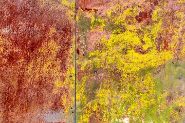 Old rusty metal painted with paint as an abstract background