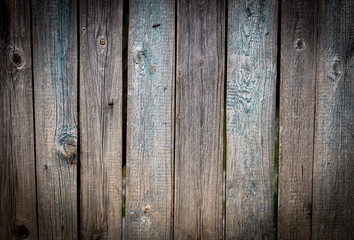 Old wooden boards on the fence