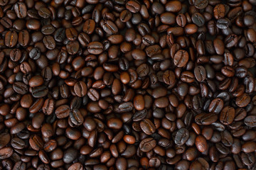 Roasted coffee beans,Coffee bean background,Dark Roasted Coffee,top view.