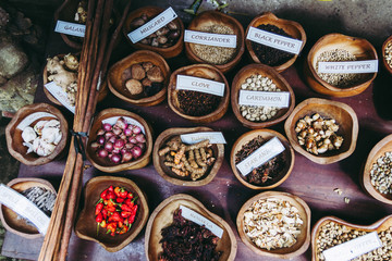 Selection of herbs and coffee in bowls