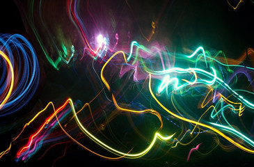 Long exposure light painting photography of abstract colourful light element. Pattern, Texture, Decoration, Wallpaper.