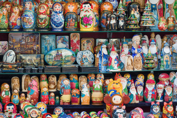 Russian wooden tourist souvenirs on the counter of a souvenir kiosk