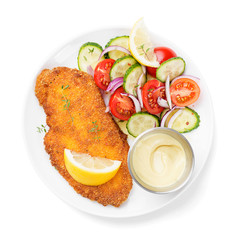 Homemade breaded chicken schnitzel with fresh vegetable salad. isolated on white background
