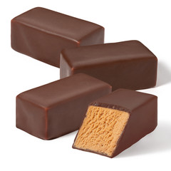 Chocolate nougat candy on a white background