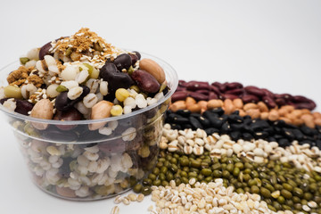 Mix of beans in a transparent cup, Zoom macro.