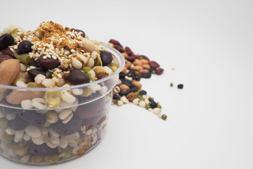 Mix of beans in a transparent cup, Zoom macro.