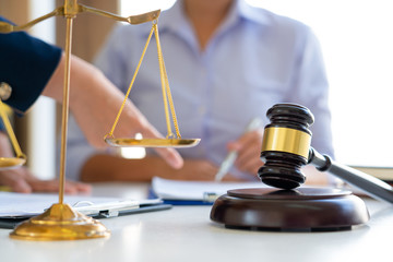 Women lawyer discussing with clients in courtroom. justice and law ,attorney, court judge, meeting concept