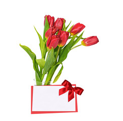 Bouquet of red tulips and a postcard. Isolated on a white.