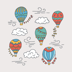 Hot air balloons and clouds. Color vector hand drawn doodle illustration