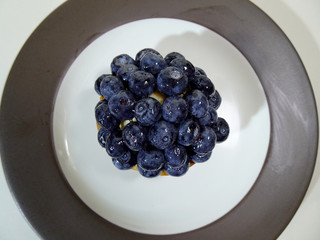 Top view of blueberry almond tart with custard filling