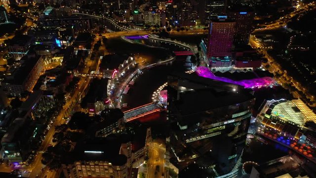 singapore city night time illuminated famous riverside bay mall aerial panorama 4k 