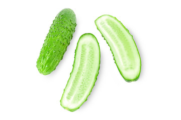 Crispy fresh green cucumber and cut into two parts close-up on a white background.
