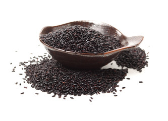 Black rice on a white background 