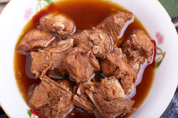 Braised pork ribs in brown sauce