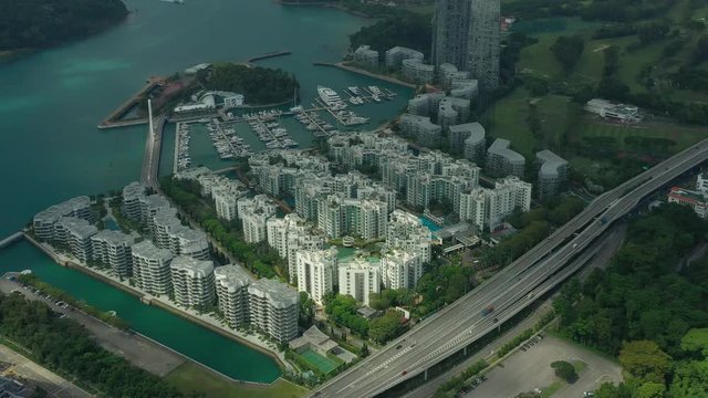 singapore city sunny day apartment bay complex yacht dock marina traffic road aerial panorama 4k 