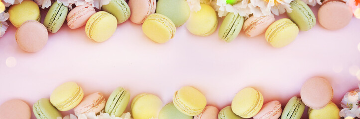 Spring background with blossom and macaroons