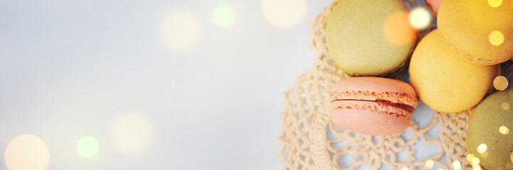 Spring background with blossom and macaroon