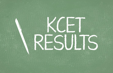 Obraz premium KCET or Karnataka Common Entrance Test results written on green board.