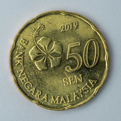 2019 Malaysia coin  50 sen isolated on white background front view © Lee