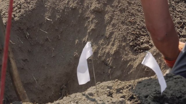 Shovels dig ground dry soil gas accident leak repair emergency rescue service men in working uniform clothes