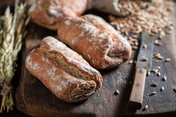 Delicious rolls on wooden and old table