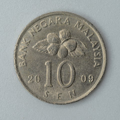 2009 Malaysia coin  10 sen isolated on white background front view © Lee
