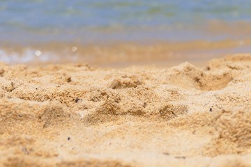 Fototapeta na wymiar Spiaggia. Sabbia e acqua di mare