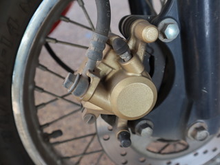 Motorcycle front brake disc and caliper.