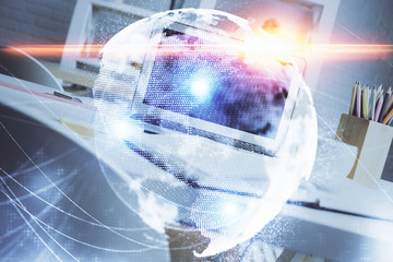 Double exposure of business theme icons and work space with computer background. Concept of success.