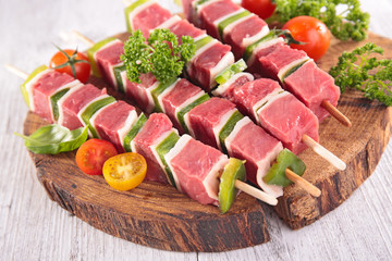 beef and bell pepper barbecue - skewer on wooden board